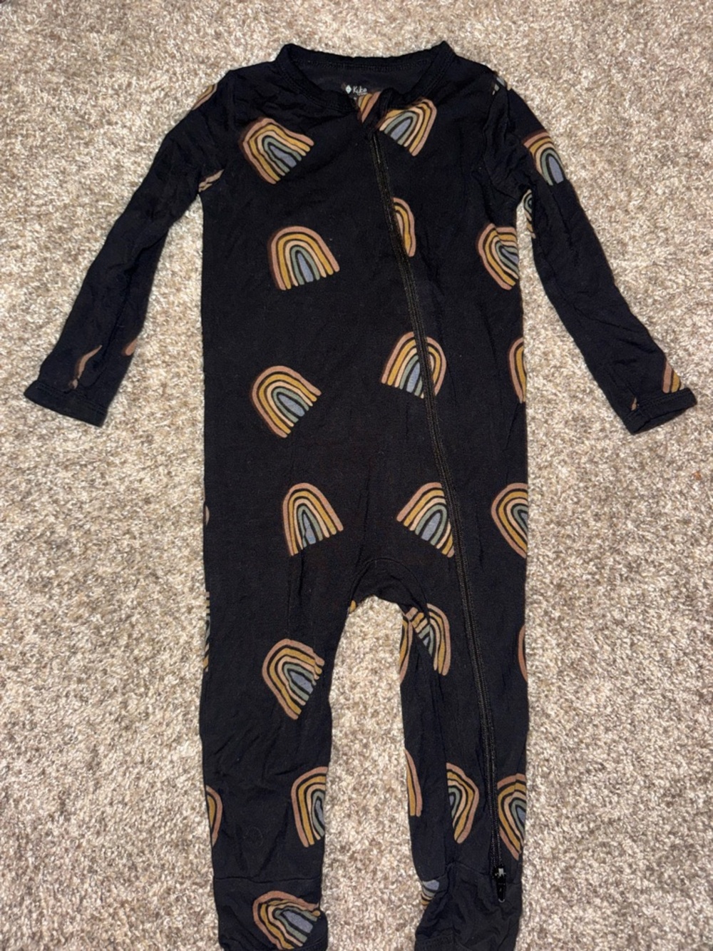 Kyte BABY Black Footed One-Piece with Tan and Cream Rainbow Print